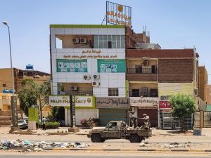 A vehicle of the paramilitary Rapid Support Forces drives down al-Sittin (sixty) road in Khartoum, on May 22, 2023, as fighting persists between two rival generals. (Photo by AFP) Sudan truce