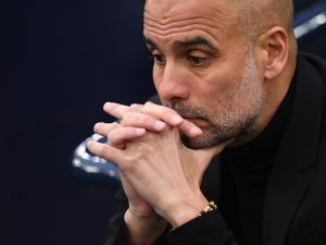 Manchester City's Spanish manager Pep Guardiola reacts ahead of the UEFA Champions League second leg semi-final football match between Manchester City and Real Madrid at the Etihad Stadium in Manchester, north west England, on May 17, 2023. (Photo by Oli SCARFF / AFP)