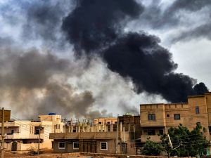 Smoke plumes billow from a fire at a lumber warehouse in southern Khartoum amidst ongoing fighting on June 7, 2023.  (Photo by AFP) Sudan