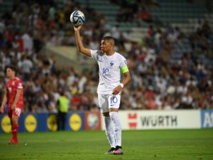 France's forward Kylian Mbappe holds the ball during the UEFA Euro 2024 group B qualification football match between Gibraltar and France at the Algarve stadium in Faro on June 16, 2023. (Photo by FRANCK FIFE / AFP)