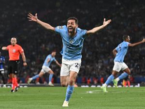 Manchester City's Portuguese midfielder #20 Bernardo Silva celebrates the opening goal during the UEFA Champions League final football match between Inter Milan and Manchester City at the Ataturk Olympic Stadium in Istanbul, on June 10, 2023. (Photo by Paul ELLIS / AFP)