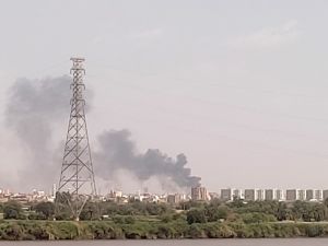A picture taken from Omdurman shows smoke billowing north of Khartoum on July 22, 2023. (Photo by AFP) Sudan