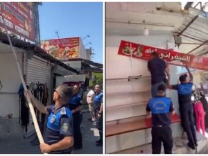 storefront signs with Arabic removed