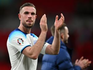 England's midfielder Jordan Henderson applauds the fans following the UEFA Euro 2024 group C qualification football match between England and Ukraine at Wembley Stadium in London on March 26, 2023. (Photo by JUSTIN TALLIS / AFP)