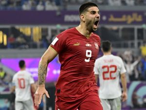 Serbia's forward #09 Aleksandar Mitrovic celebrates scoring his team's first goal during the Qatar 2022 World Cup Group G football match between Serbia and Switzerland at Stadium 974 in Doha on December 2, 2022. (Photo by JAVIER SORIANO / AFP)