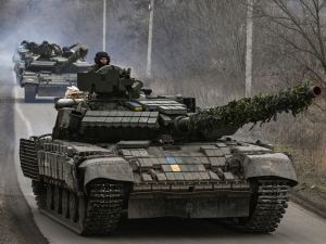 Ukrainian T64 tanks move towards Bakhmut direction, in Donetsk Oblast region, on March 20, 2023. (Photo by Aris Messinis / AFP) Leopard 1s tanks