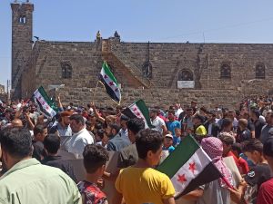 Massive protests erupt across 7 Syrian provinces