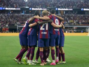 FC Barcelona celebrate on the field after Ousmane Dembélé #7 of FC Barcelona scored a goal during the first half of the pre-season friendly match against Real Madrid at AT&T Stadium on July 29, 2023 in Arlington, Texas. Sam Hodde/Getty Images/AFP (Photo by Sam Hodde / GETTY IMAGES NORTH AMERICA / Getty Images via AFP)