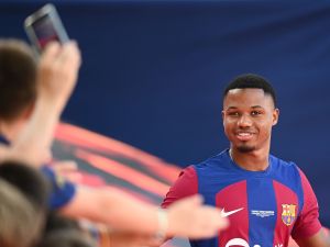 Barcelona's Spanish forward #10 Ansu Fati arrives for the 58th Joan Gamper Trophy football match between FC Barcelona and Tottenham Hotspur FC at the Estadi Olimpic Lluis Companys in Barcelona on August 8, 2023. (Photo by Pau BARRENA / AFP)