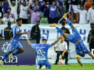 Hilal's Saudi midfielder #29 Salem al-Dawsari (R) celebrates after a goal during the Saudi Pro League football match between Al-Ittihad and Al-Hilal at Prince Abdullah al-Faisal Stadium in Jeddah on September 1, 2023. (Photo by AFP)