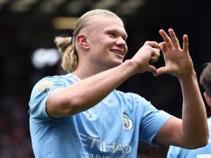 Manchester City's Norwegian striker #09 Erling Haaland celebrates scoring the opening goal during the English Premier League football match between Sheffield United and Manchester City at Bramall Lane in Sheffield, northern England on August 27, 2023. (Photo by Darren Staples / AFP)