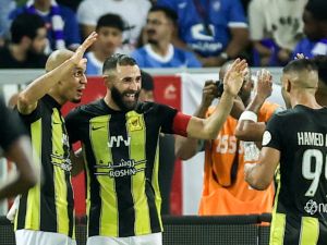 Ittihad's French forward #09 Karim Benzema (2nd-L) celebrates after a goal during the Saudi Pro League football match between Al-Ittihad and Al-Hilal at Prince Abdullah al-Faisal Stadium in Jeddah on September 1, 2023. (Photo by AFP)