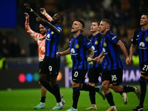 Inter Milan's Argentine forward #10 Lautaro Martinez celebrates with teammates Inter Milan's French forward #09 Marcus Thuram, Inter Milan's Albanian midfielder #21 Kristjan Asllani and Inter Milan's Italian midfielder #16 Davide Frattesi after winning 2-1 the UEFA Champions League 1st round day 3 Group D football match between Inter Milan and Salzburg at the San Siro stadium in Milan on October 24, 2023. (Photo by Marco BERTORELLO / AFP)