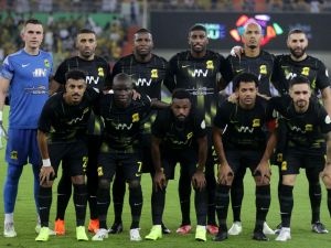 Ittihad's players pose for a group photo ahead of the Saudi Pro League football match between Al-Ittihad and Al-Tai at the Prince Abdullah al-Faisal Stadium in Jeddah on August 19, 2023. (Photo by AFP)