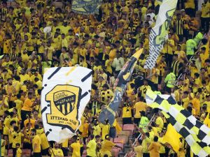 Ittihad fans cheer ahead of the AFC Champions League Group C football match between Saudi's Al-Ittihad and Iraq's Al-Quwa Al-Jawiya at the King Abdullah Sports City in Jeddah on October 23, 2023. (Photo by AFP)