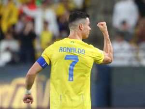 Nassr's Portuguese forward #07 Cristiano Ronaldo celebrates after scoring their second goal during the Saudi Pro League football match between Al-Nassr and Damac at the King Saud University Stadium in Riyadh on October 21, 2023. (Photo by Fayez NURELDINE / AFP)