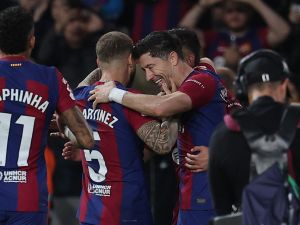 Barcelona's Polish forward #09 Robert Lewandowski celebrates scoring his team's second goal during the Spanish league football match between FC Barcelona and Deportivo Alaves at the Estadi Olimpic Lluis Companys in Barcelona on November 12, 2023. (Photo by LLUIS GENE / AFP)