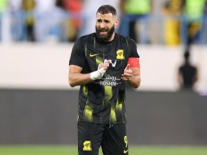 Ittihad's French forward #09 Karim Benzema gestures during the Saudi Pro League football match between Al-Ittihad and Al-Akhdoud at Prince Hathloul bin Abdulaziz Stadium in Najran on September 14, 2023. (Photo by AFP)