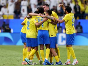 Nassr's teammates celebrate a goal during the AFC Champions League Group E football match between Saudi's al-Nassr and Qatar’s al-Duhail at the King Saud University Stadium in Riyadh on October 24, 2023. (Photo by Fayez NURELDINE / AFP)