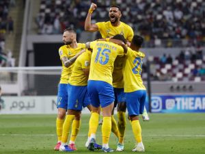 Nassr's players celebrate a goal during the AFC Champions League Group E football match between Qatar's al-Duhail and Saudi’s al-Nassr at the Khalifa International Stadium in Doha on November 7, 2023. (Photo by Karim JAAFAR / AFP)