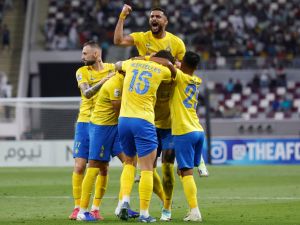 Nassr's players celebrate a goal during the AFC Champions League Group E football match between Qatar's al-Duhail and Saudi’s al-Nassr at the Khalifa International Stadium in Doha on November 7, 2023. (Photo by Karim JAAFAR / AFP)