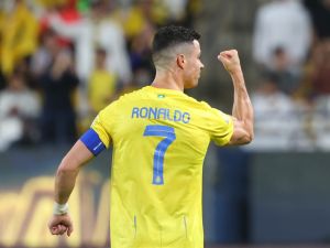 Nassr's Portuguese forward #07 Cristiano Ronaldo celebrates after scoring their second goal during the Saudi Pro League football match between Al-Nassr and Damac at the King Saud University Stadium in Riyadh on October 21, 2023. (Photo by Fayez NURELDINE / AFP)