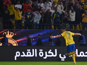 Nassr's Portuguese forward #07 Cristiano Ronaldo celebrates after scoring a goal during the Saudi Pro League football match between Al-Nassr and Al-Akhdoud in Riyadh's Al-Awal Park Stadium on November 24, 2023. (Photo by AFP)