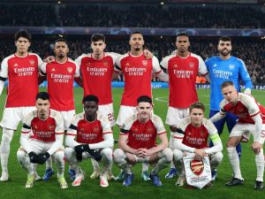 Arsenal line up before the UEFA Champions League Group B football match between Arsenal and RC Lens at the Arsenal Stadium in north London on November 29, 2023. (Photo by Adrian DENNIS / AFP)