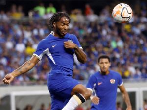 Chelsea's English midfielder Raheem Sterling jumps for the ball during a pre-season friendly football match between Chelsea FC and Borussia Dortmund BVB at Soldier Field in Chicago, Illinois, on August 2, 2023. (Photo by KAMIL KRZACZYNSKI / AFP)
