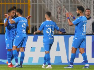 Hilal's Saudi midfielder #29 Salem al-Dawsari (L) celebrates his goal with his team during the AFC Champions League Group D football match between Iran’s Nassaji Mazandaran and Saudi Arabia’s Al-Hilal at Prince Faisal Bin Fahd Stadium in Riyadh on December 4, 2023. (Photo by Fayez NURELDINE / AFP)