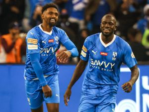 Hilal's Senegalese defender #03 Kalidou Koulibaly (R) celebrates after a goal during the Saudi Pro League football match between Al-Hilal and Al-Nassr at the King Fahd International Stadium in Riyadh on December 1, 2023. (Photo by Fayez NURELDINE / AFP)