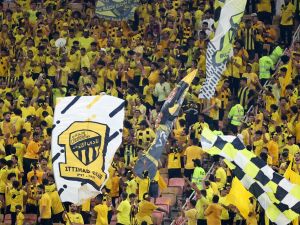 Ittihad fans cheer ahead of the AFC Champions League Group C football match between Saudi's Al-Ittihad and Iraq's Al-Quwa Al-Jawiya at the King Abdullah Sports City in Jeddah on October 23, 2023. (Photo by AFP)