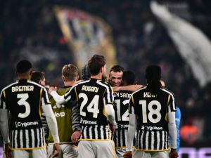 Juventus' Italian defender #04 Federico Gatti celebrates with teammates after winning the Italian Serie A football match between Juventus and Napoli, at The Allianz Stadium, in Turin on December 8, 2023. (Photo by Marco BERTORELLO / AFP)