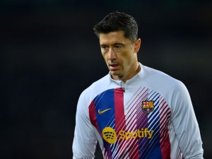 Barcelona's Polish forward #09 Robert Lewandowski looks on before the start of the Spanish league football match between FC Barcelona and Girona FC at the Estadi Olimpic Lluis Companys in Barcelona on December 10, 2023. (Photo by Pau BARRENA / AFP)