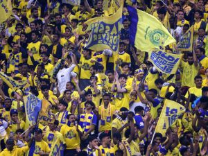 Supporters cheer in the stands during the Saudi Pro League football match between Al-Hilal and Al-Nassr at the King Fahd International Stadium in Riyadh on December 1, 2023. (Photo by Fayez NURELDINE / AFP)