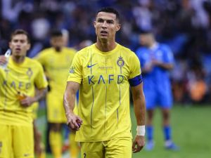 Nassr's Portuguese forward #07 Cristiano Ronaldo reacts during the Saudi Pro League football match between Al-Hilal and Al-Nassr at the King Fahd International Stadium in Riyadh on December 1, 2023. (Photo by Fayez NURELDINE / AFP)