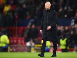 Manchester United's Dutch manager Erik ten Hag walks on the pitch after the UEFA Champions League group A football match between Manchester United and FC Bayern Munich at Old Trafford stadium in Manchester, north west England, on December 12, 2023. (Photo by PETER POWELL / AFP)