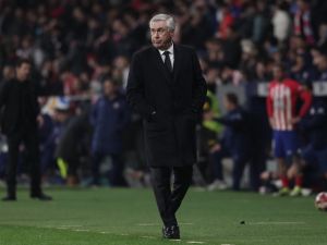 Real Madrid's Italian coach Carlo Ancelotti walks along the touchline during the Spanish Copa del Rey (King's Cup) football match between Club Atletico de Madrid and Real Madrid CF at the Metropolitano stadium in Madrid on January 18, 2024. (Photo by Thomas COEX / AFP)