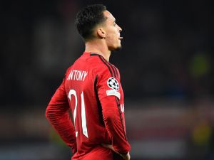 Manchester United's Brazilian midfielder #21 Antony reacts during the UEFA Champions League group A football match between Manchester United and FC Bayern Munich at Old Trafford stadium in Manchester, north west England, on December 12, 2023. (Photo by PETER POWELL / AFP)