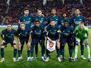 Arsenal's team players pose for a photograph ahead of a UEFA Champions League group B football match between PSV Eindhoven and Arsenal FC at the Philips Stadium in Eindhoven, on December 12, 2023. (Photo by KENZO TRIBOUILLARD / AFP)