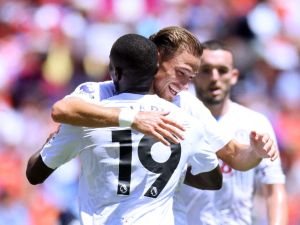 Matty Cash of Aston Villa celebrates with teammate Moussa Diaby after scoring the teams third goal during the Premier League Summer Series match between Aston Villa and Brentford FC at FedExField on July 30, 2023 in Landover, Maryland. Mike Stobe/Getty Images/AFP (Photo by Mike Stobe / GETTY IMAGES NORTH AMERICA / Getty Images via AFP)