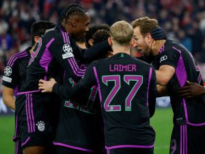 Bayern Munich's English forward #09 Harry Kane (R) celebrates scoring the opening goal with his teammates during the UEFA Champions League Group A football match between FC Bayern Munich and Galatasaray AS in Munich, southern Germany on November 8, 2023. (Photo by MICHAELA REHLE / AFP)