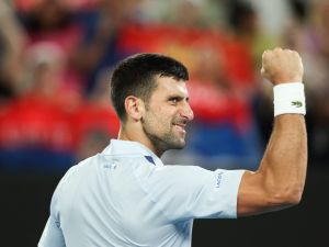 Serbia's Novak Djokovic celebrates after victory against France's Adrian Mannarino during their men's singles match on day eight of the Australian Open tennis tournament in Melbourne on January 21, 2024. (Photo by Martin KEEP / AFP)