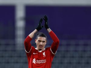Liverpool's Uruguayan striker #09 Darwin Nunez applauds at the end of the UEFA Europa League football match between Union Saint Gilloise and Liverpool FC at the Lotto Park in Brussels on December 14, 2023. (Photo by Kenzo TRIBOUILLARD / AFP)