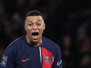 Paris Saint-Germain's French forward #07 Kylian Mbappe reacts during the French Champions' Trophy (Trophee des Champions) football match between Paris Saint-Germain (PSG) and Toulouse FC at the Parc des Princes stadium in Paris on January 3, 2024. (Photo by FRANCK FIFE / AFP)