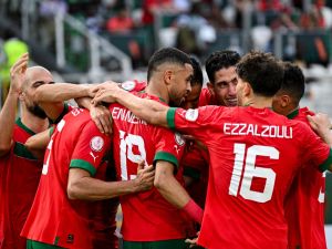 Morocco's players celebrate scoring their team's first goal during the Africa Cup of Nations (CAN) 2024 group F football match between Morocco and Tanzania at Stade Laurent Pokou in San Pedro on January 17, 2024. (Photo by SIA KAMBOU / AFP)