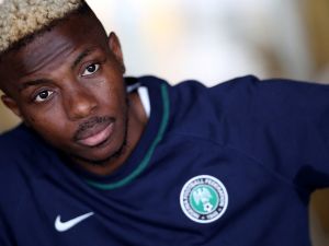Nigeria's forward #9 Victor Osimhen answers journalists' questions at the hotel in Abidjan on January 16, 2024 during the Africa Cup of Nations (CAN) 2024 football tournament. (Photo by FRANCK FIFE / AFP)