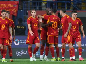 Roma's players celebrate their second goal, during a friendly football match with Saidi's Al-Shabab at Al-Awwal Park in Riyadh, on January 24, 2024. (Photo by Fayez NURELDINE / AFP)