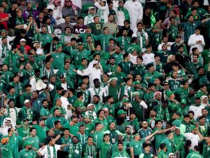 Saudi Arabia supporters cheer during the Qatar 2023 AFC Asian Cup Group F football match between Saudi Arabia and Thailand at Education City Stadium in al-Rayyan, west of Doha, on January 25, 2024. (Photo by Giuseppe CACACE / AFP)