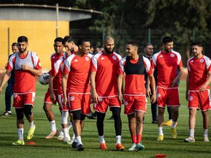 Tunisia's midfielder Aissa Laidouni (C) and Tunisia's defender Yan Valery (C-L) take part in a training session at lycee Houphuet -Bobiny of Korhogo on January 15, 2024 on the eve of the 2024 Africa Cup of Nations (CAN) football match between Namibia and Tunisia (Photo by FADEL SENNA / AFP)